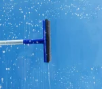 rubber-squeegee-cleans-window-clears-stripe-soaped-window-cleaning-service-concept-2048x1365