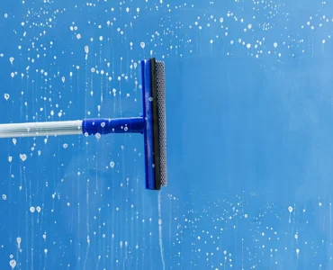 rubber-squeegee-cleans-window-clears-stripe-soaped-window-cleaning-service-concept-2048x1365 rubber-squeegee-cleans-window-clears-stripe-soaped-window-cleaning-service-concept-2048x1365