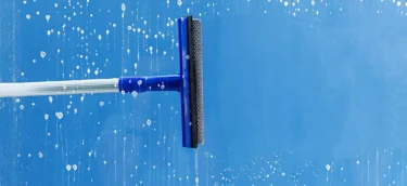 rubber-squeegee-cleans-window-clears-stripe-soaped-window-cleaning-service-concept-2048x1365