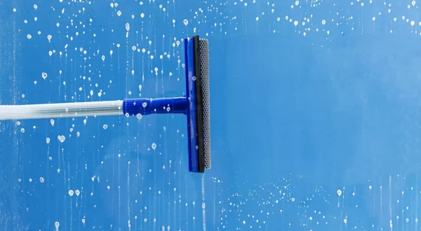 rubber-squeegee-cleans-window-clears-stripe-soaped-window-cleaning-service-concept-2048x1365 rubber-squeegee-cleans-window-clears-stripe-soaped-window-cleaning-service-concept-2048x1365