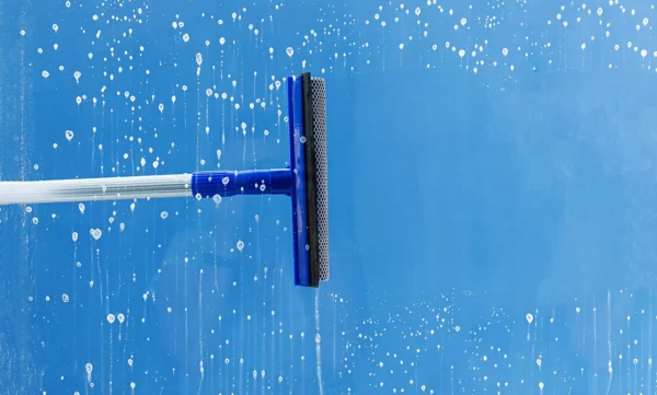 rubber-squeegee-cleans-window-clears-stripe-soaped-window-cleaning-service-concept-2048x1365